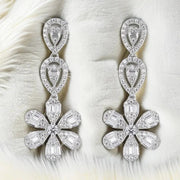 Aretes Moissanita 4.5 Ct. Colgantes Largos Florecita Plata. Plateado